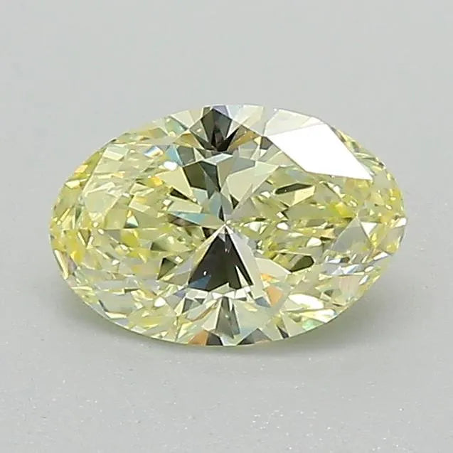 Diamant ovale de 0,61 ct cultivé en laboratoire (jaune fantaisie, pureté VS2, taille VG, IGI)